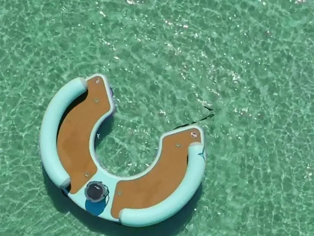 This Giant Curved Inflatable Dock Holds Up To 6 Adults and a Cooler - Image 9